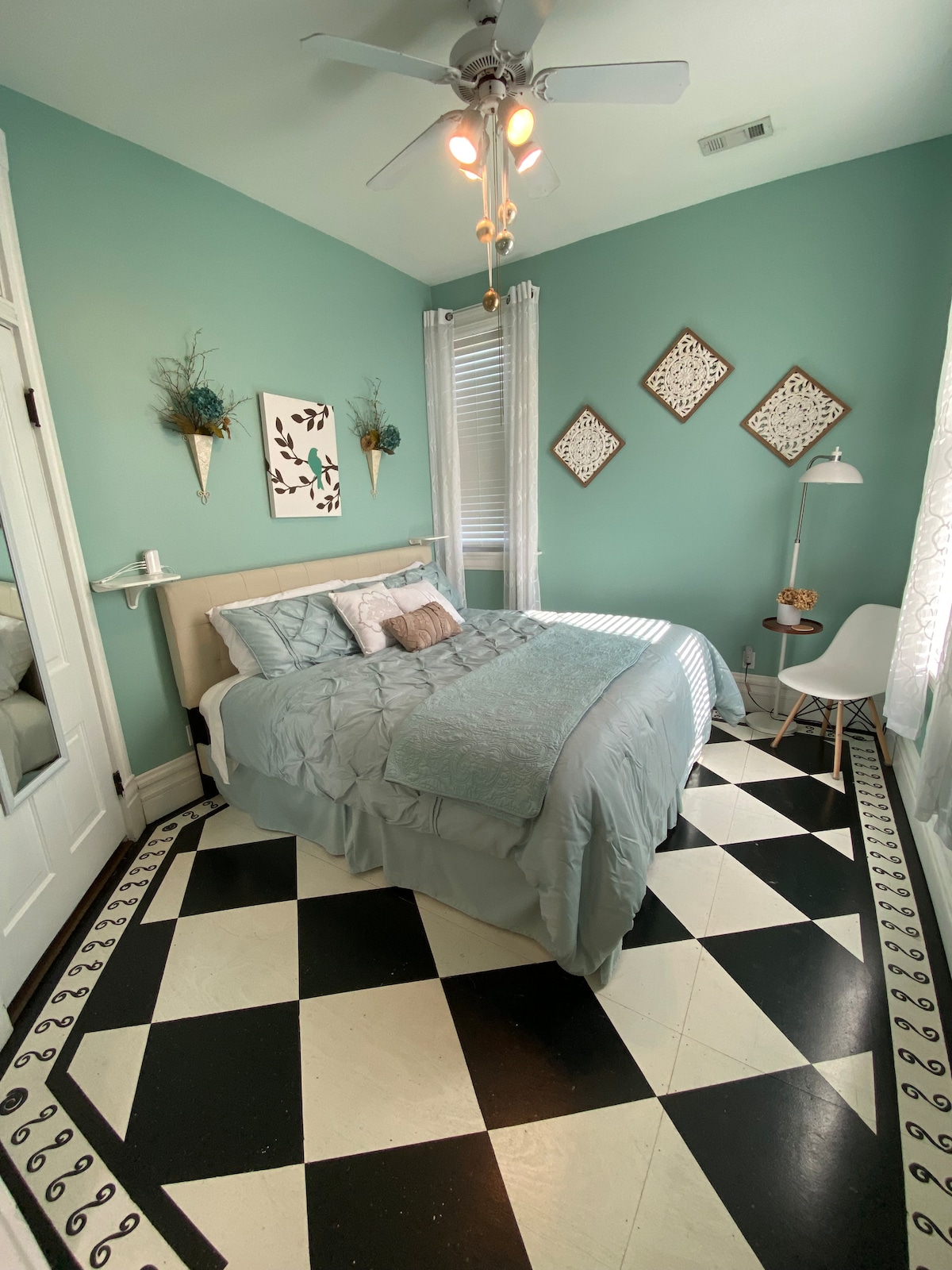 Elegant ensuite guestroom with king bed and historic details
